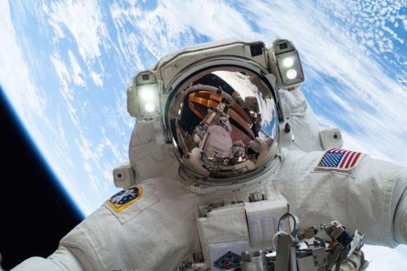 Selfie by Mike Hopkins during a spacewalk on Christmas Eve, 2013